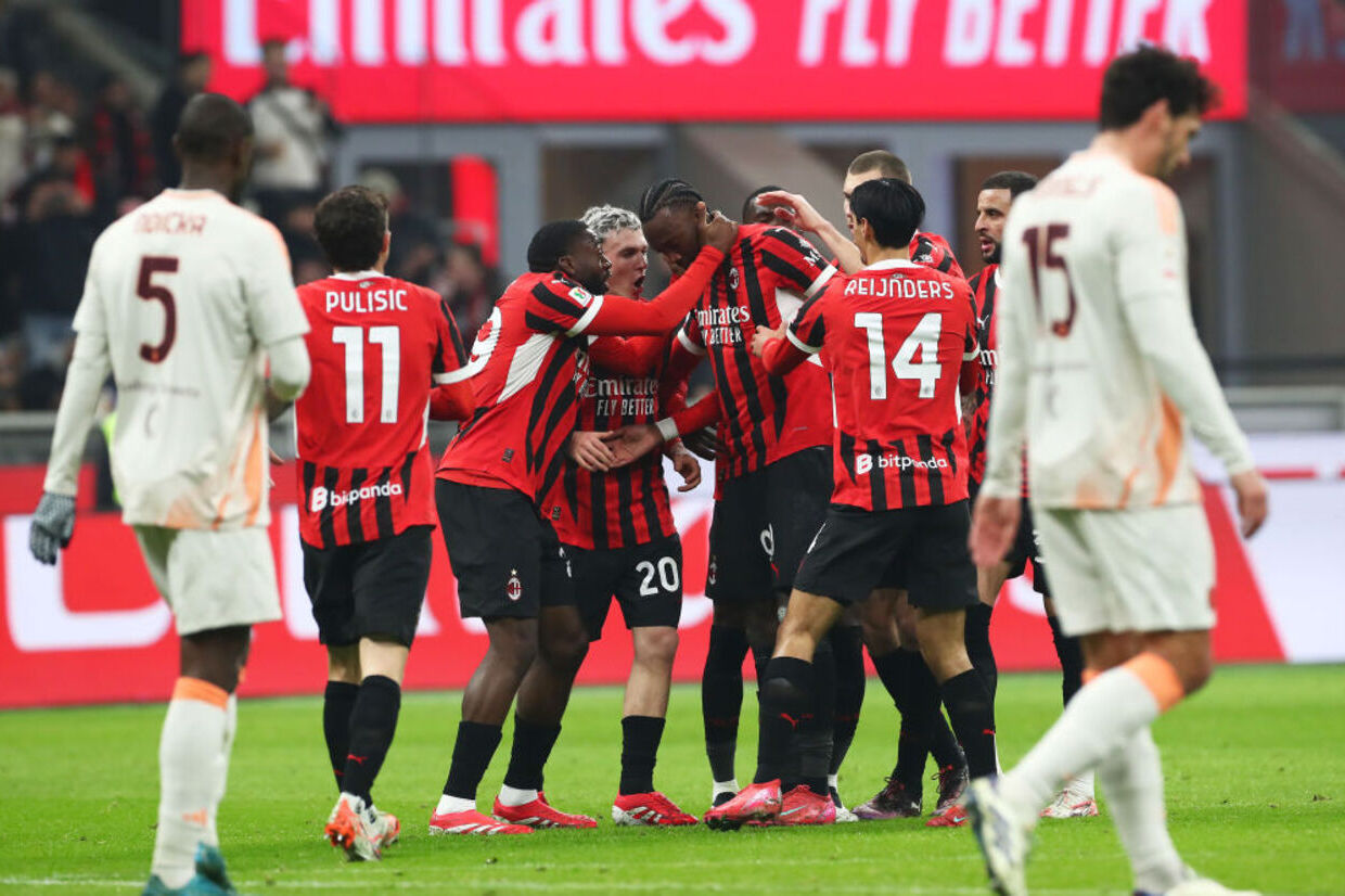 AC Milan march into Italian cup semis with Abrahams double